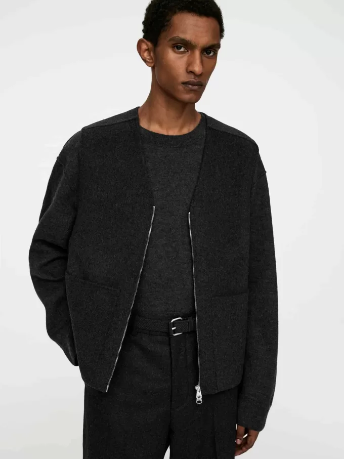 Geflochtener Gürtel mit Lederbesatz Geflochtener Gürtel mit Lederbesatz