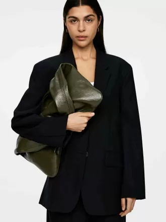 Glänzende Ledertasche Glänzende Ledertasche