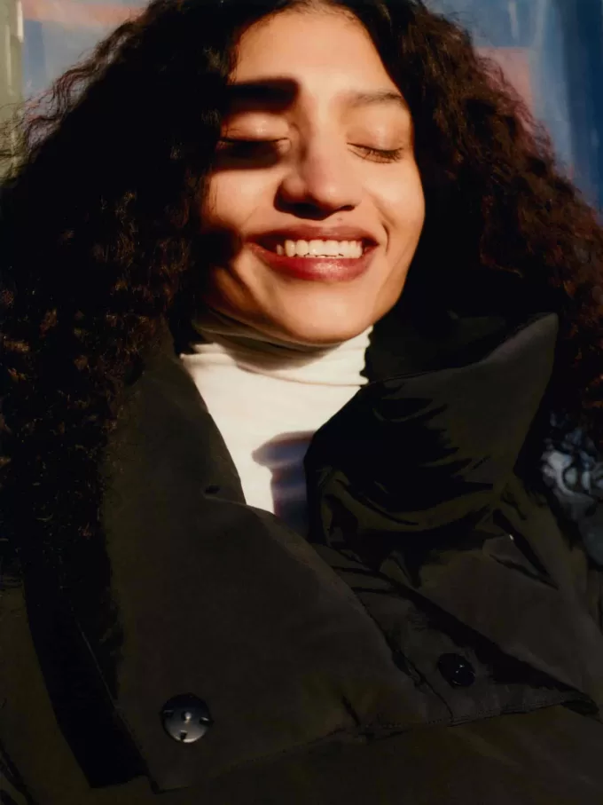 Upcycled Daunenjacke mit hohem Kragen Upcycled Daunenjacke mit hohem Kragen